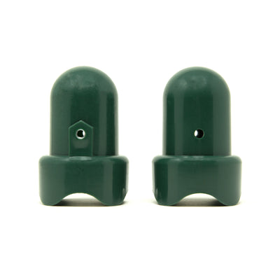 Two green pole caps facing opposite directions. 