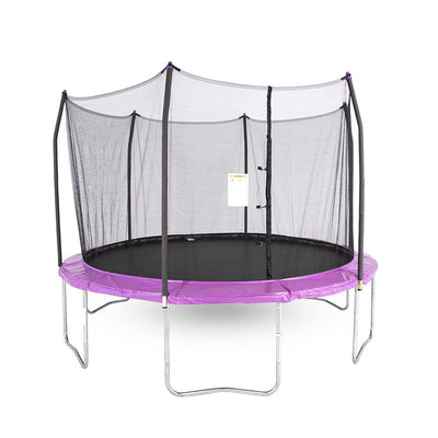 Twelve-foot round kids trampoline with black net enclosure and jump mat; purple frame pad and pole caps; and gray foam padded poles.